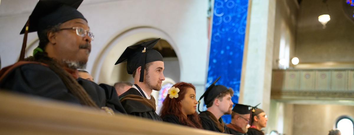 close up VCFA summer 2023 graduates watch commencement speech