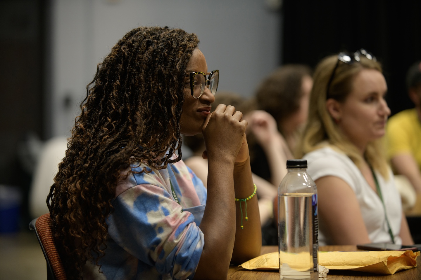 VCFA MFA in Film students listen intently during a lecture as part of their low-residency MFA program.