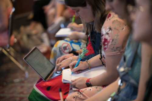A VCFA Writing for Children and Young Adults student attends a lecture during summer residency to better learn what is a YA novel and the nuances of writing for young adults.
