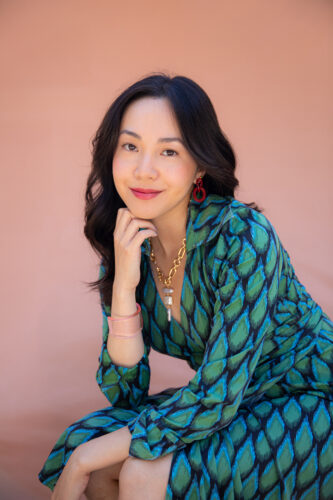 Smiling picture of VCFA writer, an expert on how to write faster. 