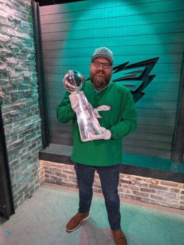 JohnPaul Beattie holding the Philadelphia Eagles 2025 Super Bowl trophy 
