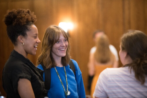 VCFA writing for children and young adults students gather and smile after paying vcfa tuition for residency.