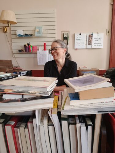 Image of VCFA Library Director Tia McCarthy at the VCFA Library 