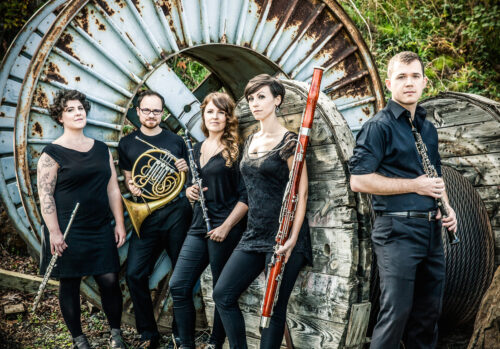 City of Tomorrow Wind Quintet pose with their instruments